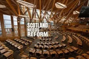 Holyrood debating chamber with the "Scotland Needs Reform" logo overlayed