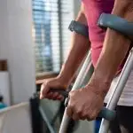 Female using crutches