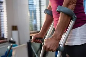 Female using crutches