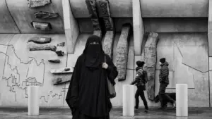 Woman in a burqa in front of Holyrood